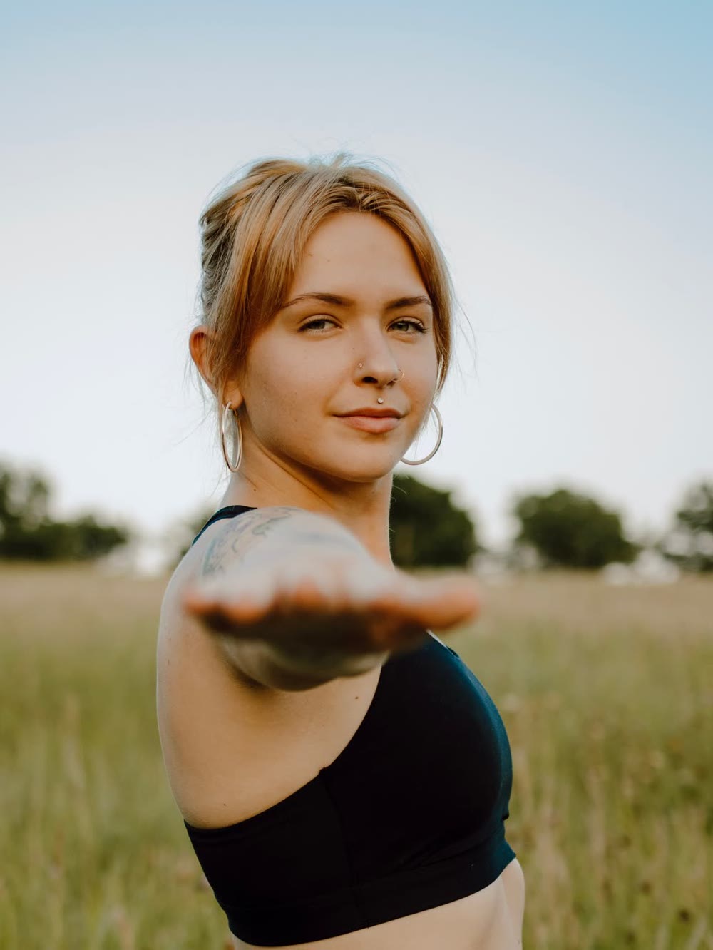 Anna Shirley in a field at sunset